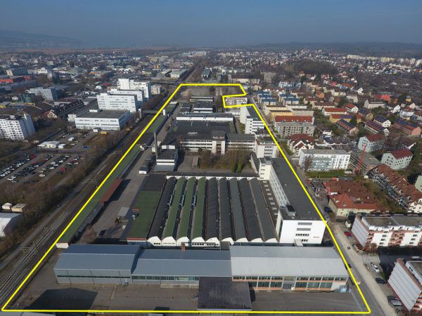 Auf ehemaligem Industrieareal zwischen Bücklestraße, Oberlohnstraße und Bahnlinie realisiert i+R ein Quartier. i+R Wohnbau